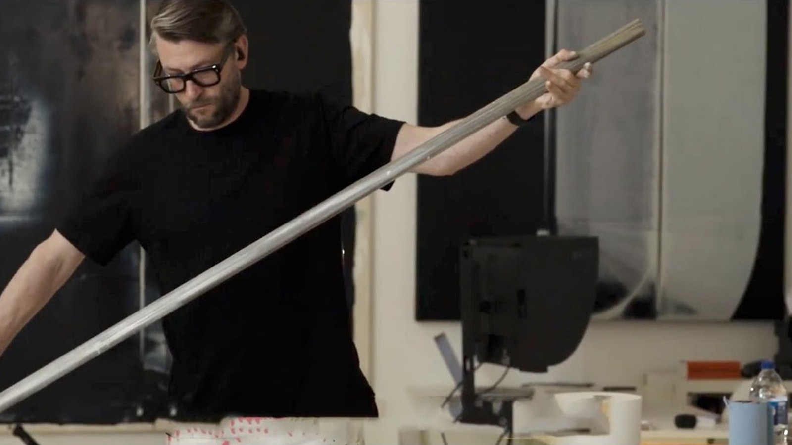 Alex Kuznetsov in the Lisbon studio with an aluminium straightedge, still from the interview
